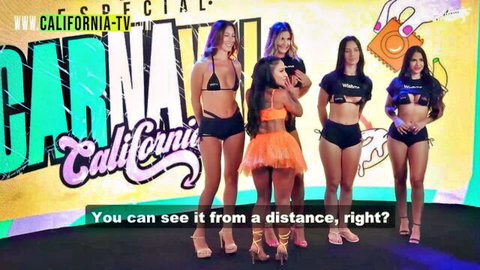 Taluane Boom with sexy Latinas in bikinis on Califórnia TV stage