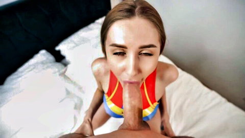 Superheroine in red-blue costume gives intense blowjob, big ass view, POV style