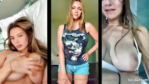 Blonde with huge tits poses topless on bed covering nipples and flaunts deep cleavage