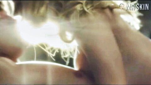 Sydney Sweeney blonde star in ecstatic close-up with glowing skin tease
