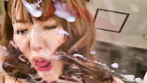 Yui Hatano with cumshot facial, eyes closed in ecstasy, JAV bukkake scene