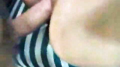 Nessa Devil's perky pale breasts exposed in striped top by photographer's hand