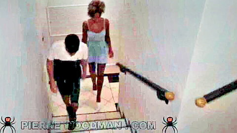 Romy Indy ebony teen in sexy blue dress walking up stairs, followed by man