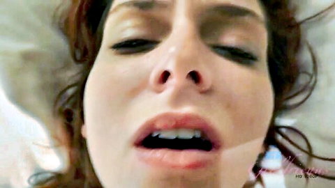 Emma Evins redhead in ecstasy close-up, open mouth pleasure face
