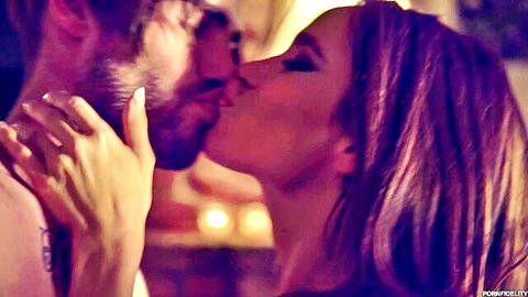 Sandee Westgate passionately kissing bearded man in intimate embrace