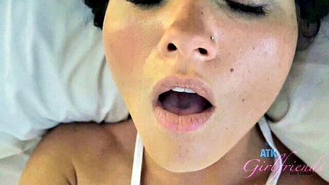 Brunette teen girlfriend with fair skin opens wide mouth tongue out in POV closeup