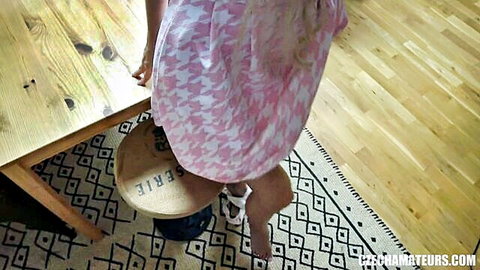 Busty Czech Florane Russell in pink polka-dot dress teasing