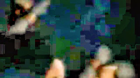 Blurry tentacle hentai scene with pale figures and green shadows