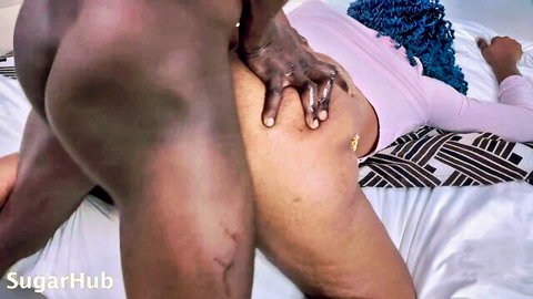 Ebony man groping curvy woman's breast in hardcore sex scene