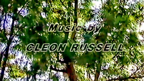 Ebony Ayes in vintage 1989 adult video All My Beauties 1, music credit over green foliage