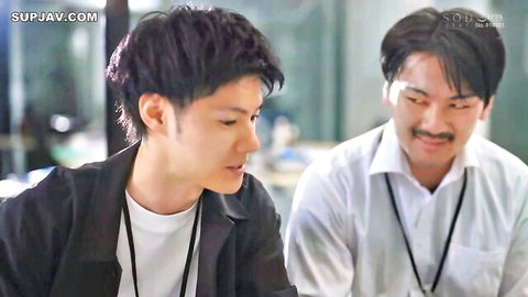 Two Asian male colleagues in office attire, close after drinking party one-night stand