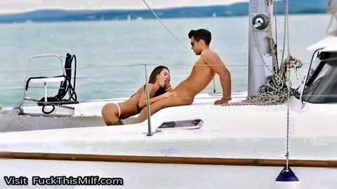 Busty blonde in bikini rides naked stranger on yacht