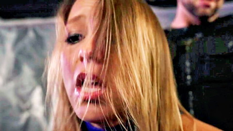 Blonde woman with ecstatic open-mouth expression during intense oral encounter