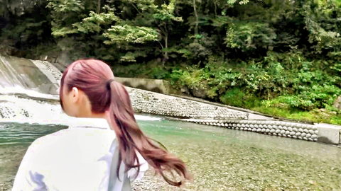 Japanese ponytail teen cheerleader in white shirt by waterfall, pink hair