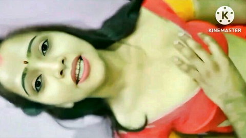 Indian Desi woman in red saree lying down as man touches her cleavage, teasing bhabhi scene