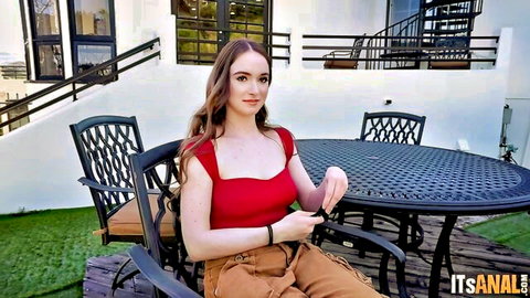 Hazel Moore in red top and pants, teasing outdoors for BBC DP action