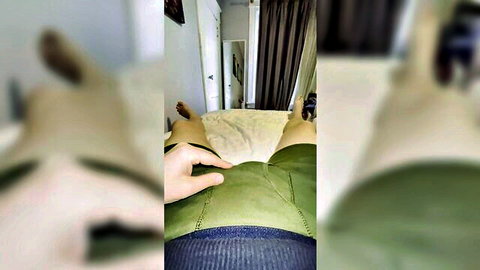 POV hand groping crotch between spread thighs with green pants pulled down amateur