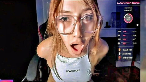 Horny redhead with glasses teasing open mouth in white tank top