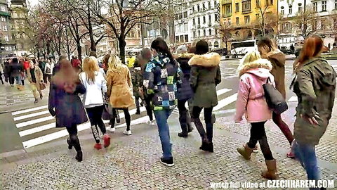 Group of Czech girls in winter coats walking to harem home party