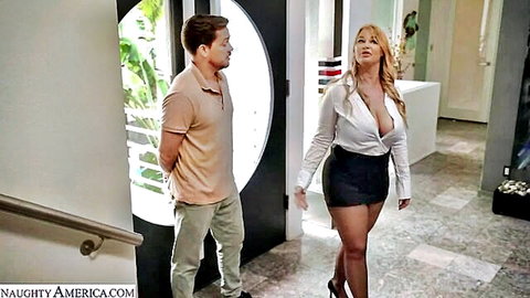 Curvy blonde MILF with huge tits in unbuttoned blouse and mini skirt teasing man at door