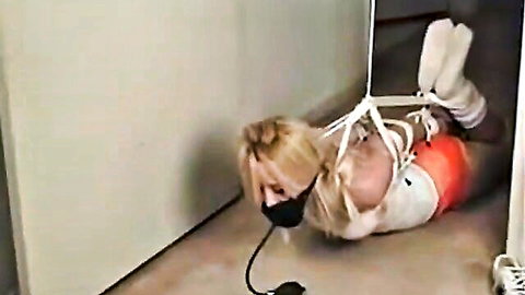 Blonde Hooters girl Melissa hogtied and gagged in white shorts