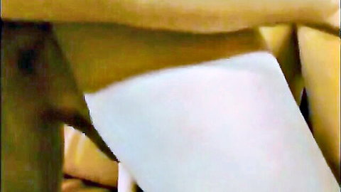 Pauline Allen in sexy white lingerie, teasing pose from amateur video