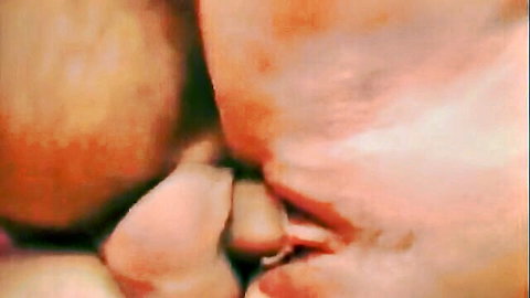 Mature woman in threesome eagerly working two dicks close-up