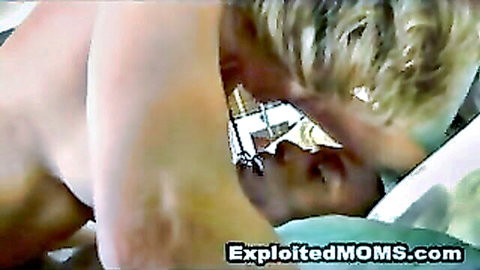 Blonde MILF with huge tits kissed and fondled from behind by white guy