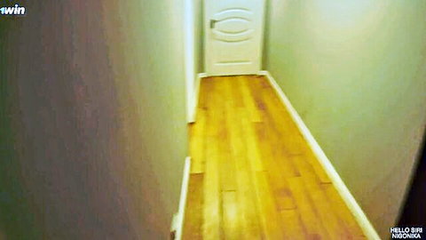 Empty hallway leading to white bedroom door in young straight threesome porn video