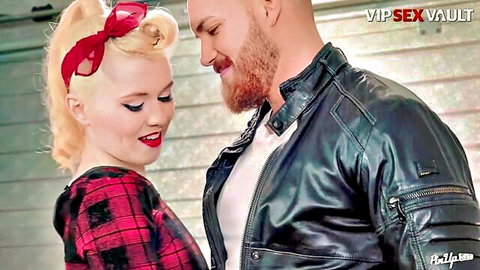 Misha Cross in pinup dress nuzzling bearded man before date