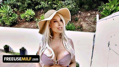 Busty blonde MILF in skimpy purple bikini top teasing massive cleavage outdoors