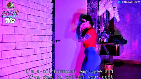 Kleo Kain as sexy casino debt collector in red top and tight jeans