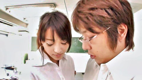 Cute Japanese brunette student in white blouse gazes seductively at teacher in classroom taboo