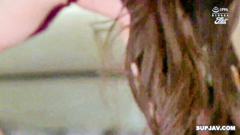 Brunette East Asian woman with dreadlocks eagerly sucking thick cock in intense blowjob close-up