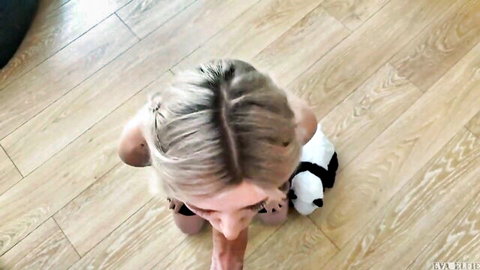 Eva Elfie kneels learning blowjob on stepbrother's dick with panda toy