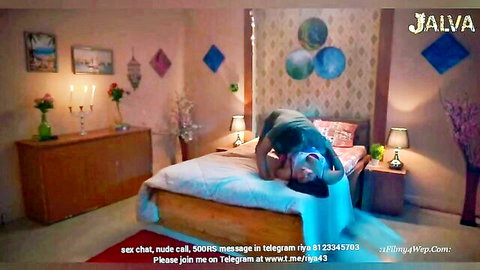 Indian babe in red thong arches juicy ass high on bed in teasing doggy pose