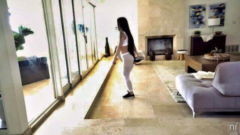 Jade Kush in tight white yoga pants, bending and stretching seductively