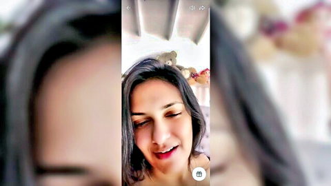 Nishala Nishshanka smiling in sexy tango live cam show