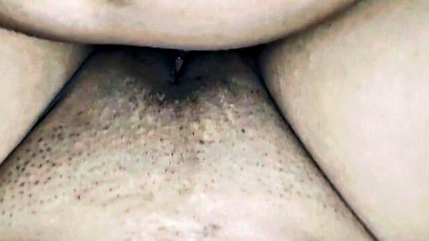Close-up of mature woman's hairy pussy in amateur cuckold video