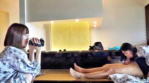 Jenny Kiss nude posing legs spread, filmed by Asian female in JAV hotwife scene