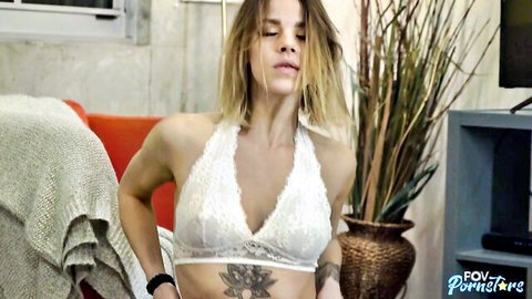 Evelin Stone in seductive white lace bralette, blonde with chest tattoo