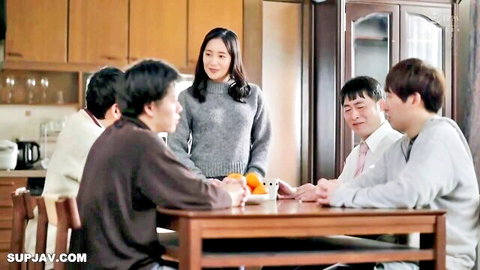 Rieko Hiraoka as stepmom in gray sweater chatting in kitchen with men