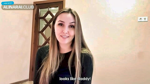Alina Rai blonde stepmom in black top, seductive smile