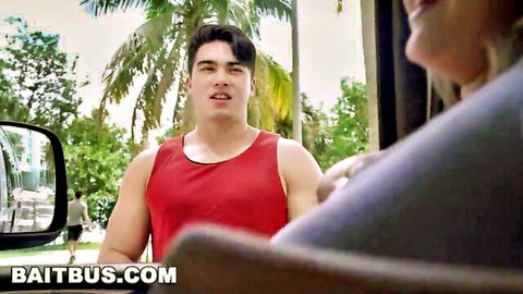 Muscular guy in red tank top chats with smiling woman on Bait Bus, Dale Savage featured