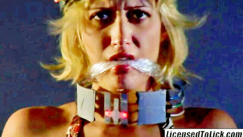Kimberly Kane in futuristic BDSM collar and gag, lesbian slave scene