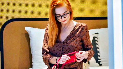 Joyce, 23yo redhead nurse holding red panties seductively