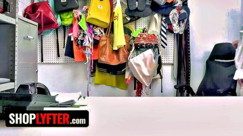 Shoplifter caught with colorful bags in security room, ShopLyfter theft scene