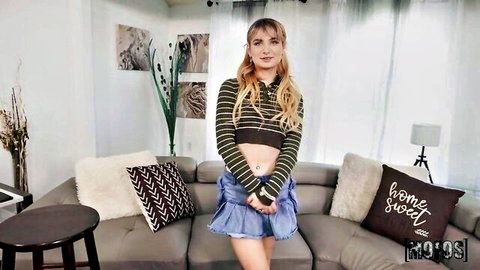 Tiny blonde with big booty in striped crop top and mini skirt posing seductively