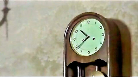 Vintage wooden grandfather clock with glowing green face and swinging pendulum in retro scene