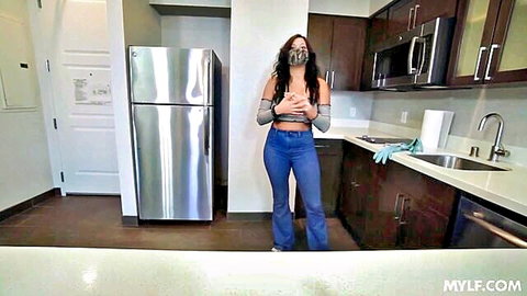 Mona Azar in sexy crop top and jeans, nervous stepmom quarantine pose